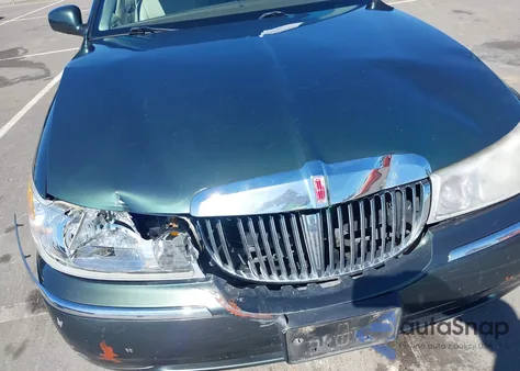 1999 Lincoln Town Car Executive из США, поврежденный, VIN 1LNHM81W7XY650105